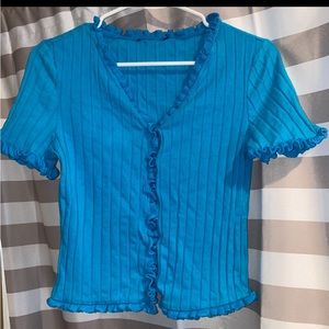 Blue ruffle button up top